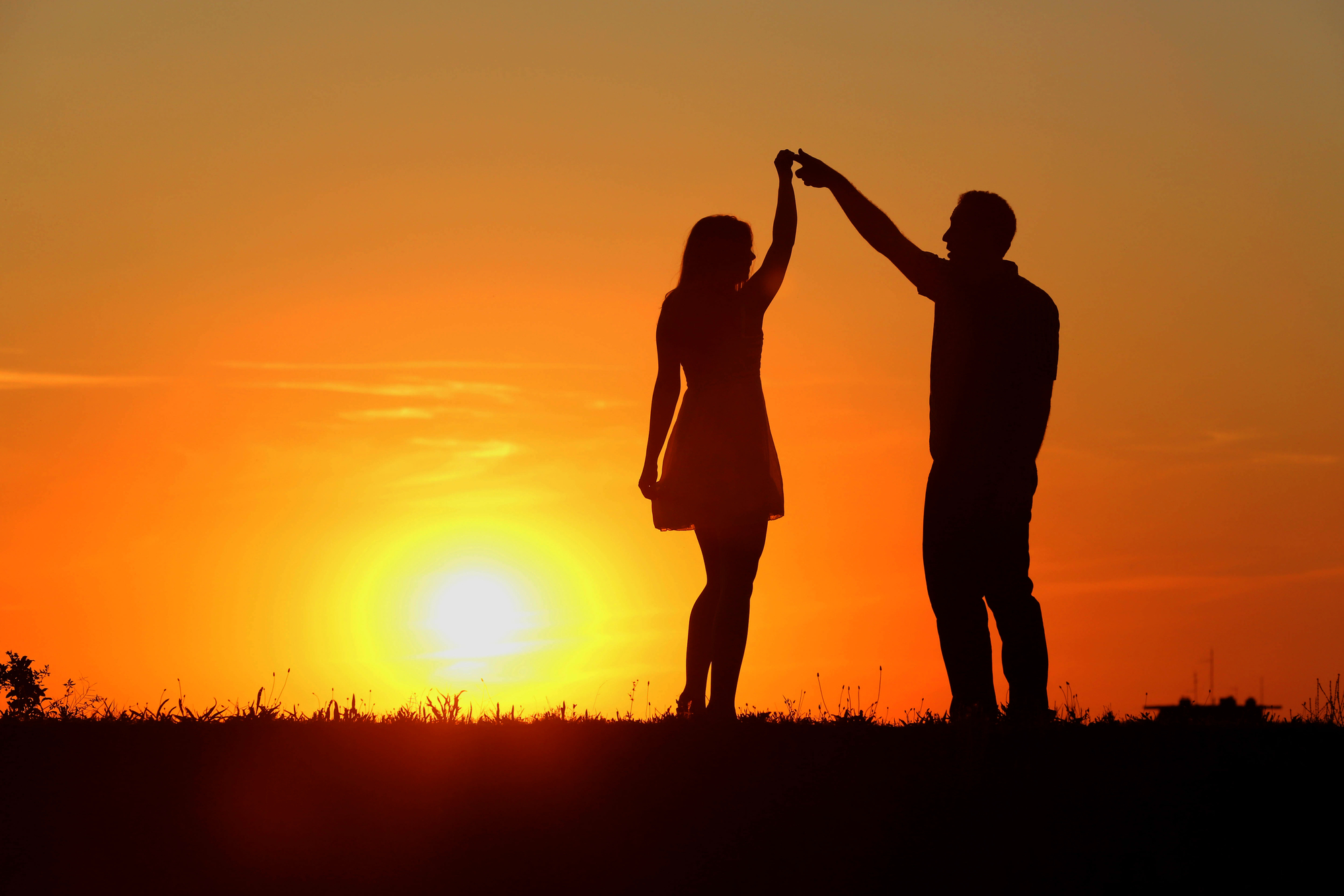 Divorce Litigation Attorneys Washington - couple dancing at sunset